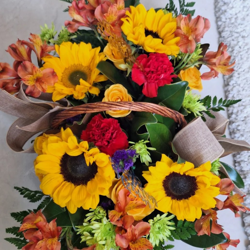Signature Floral Arrangement With Sunflowers in Wicker Basket